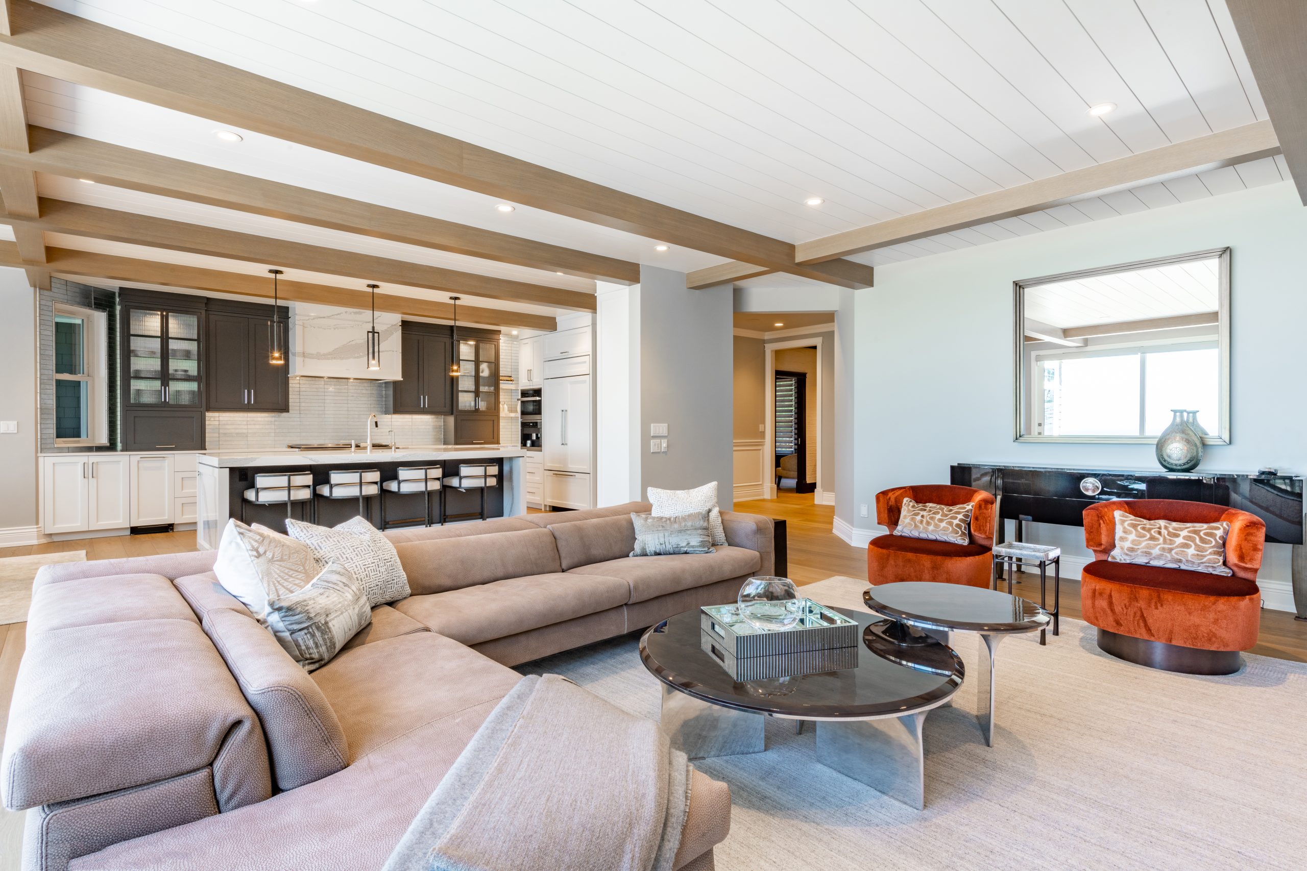 Interior photographs of a luxurious residential home den study dining room kitchen living room bedroom bathroom walk in closet glass shower butler pantry grand piano pool table and a grand fireplace.
