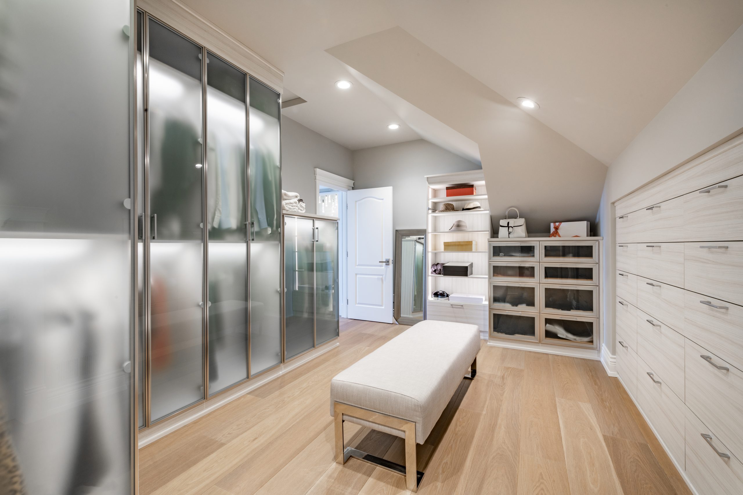 Interior photographs of a luxurious residential home den study dining room kitchen living room bedroom bathroom walk in closet glass shower butler pantry grand piano pool table and a grand fireplace.